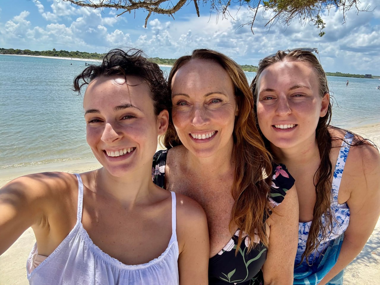 Andrea Ware with her daughters at the beach